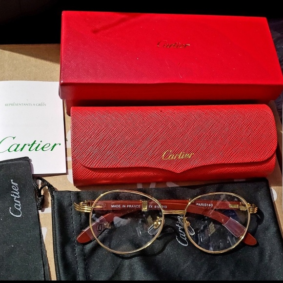 Cartier Other - Oval wood and gold frame Cartier clear lenses